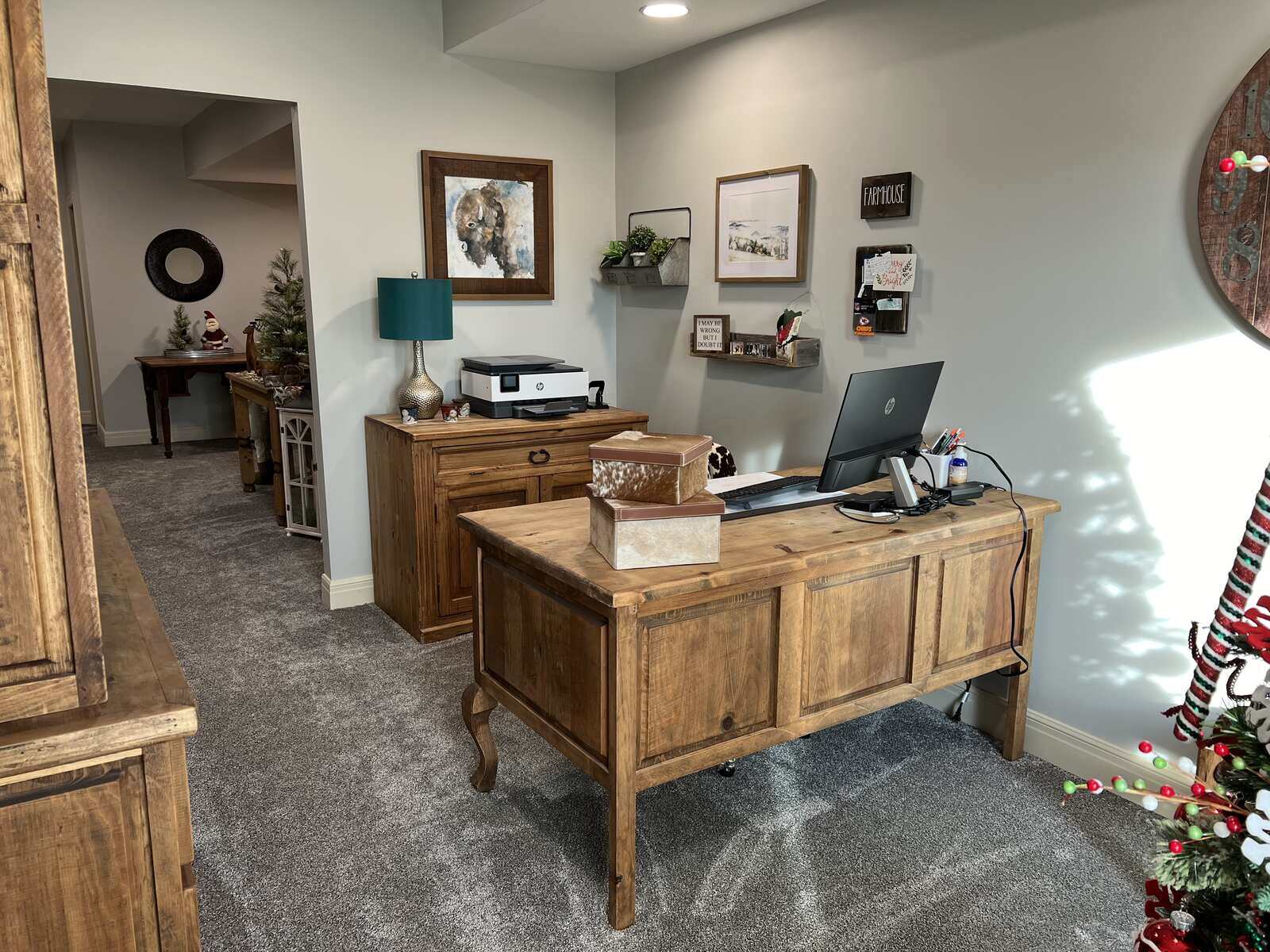 Basement home office remodel with a rustic wood desk and built-in storage by Top Shelf Home Builders in Metro Kansas City. Basement home office remodel with a rustic wood desk and built-in storage by Top Shelf Home Builders in Metro Kansas City.