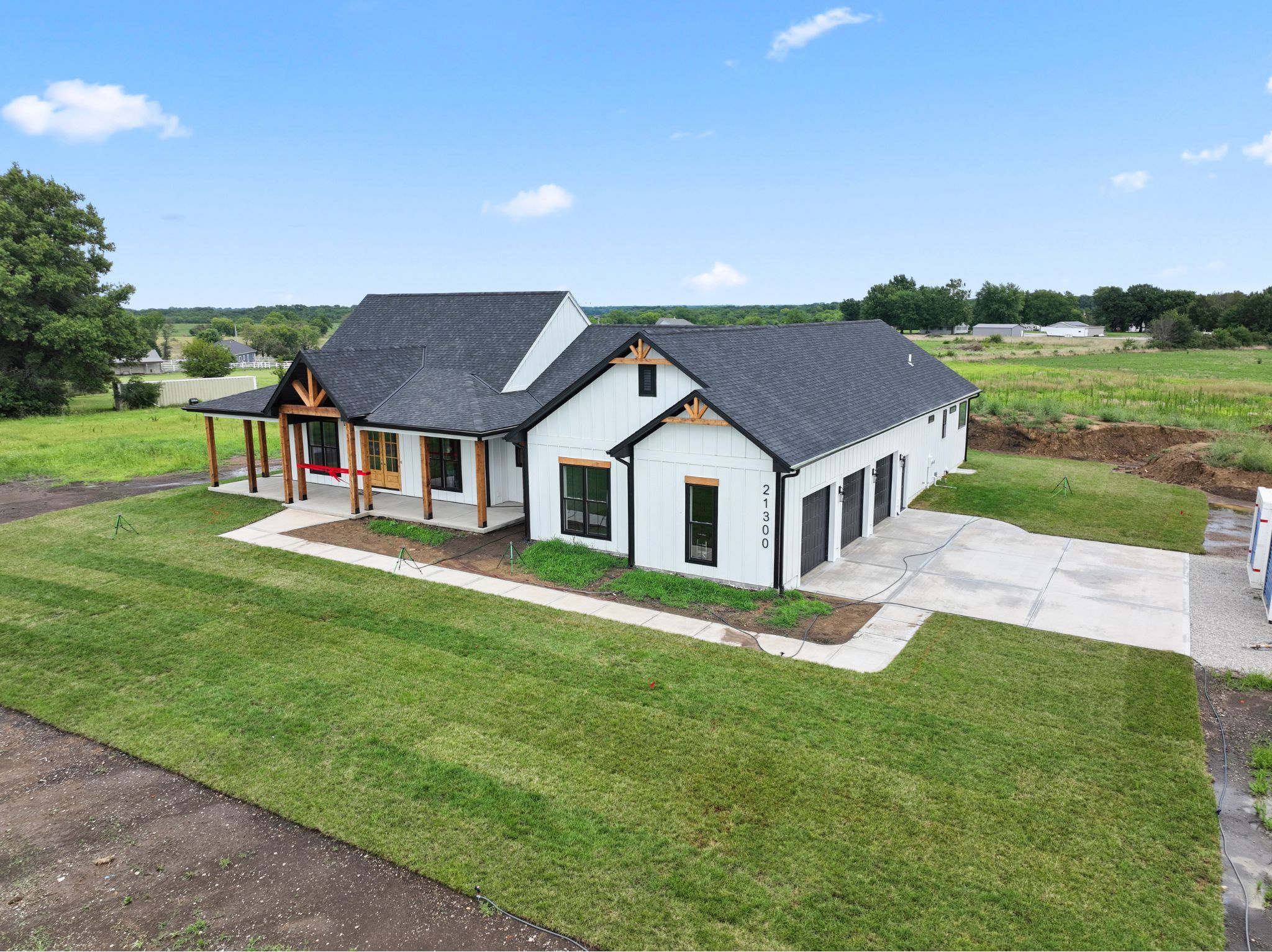 modern farmhouse style custom home in pleasant hill, mo